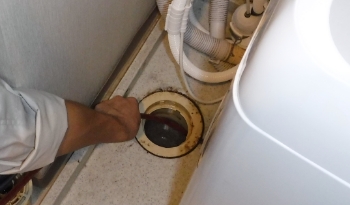 Washing machine drain outlet